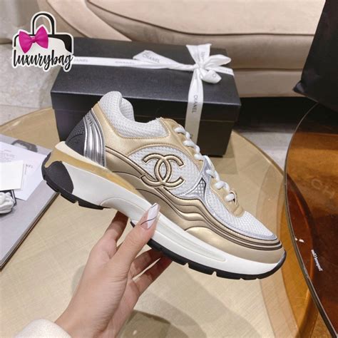 chanel shoe with laminated weave|Chanel runner gold laminate shoes.